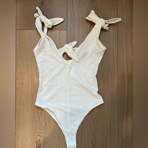 Blue Blush white ribbed bodysuit with ties